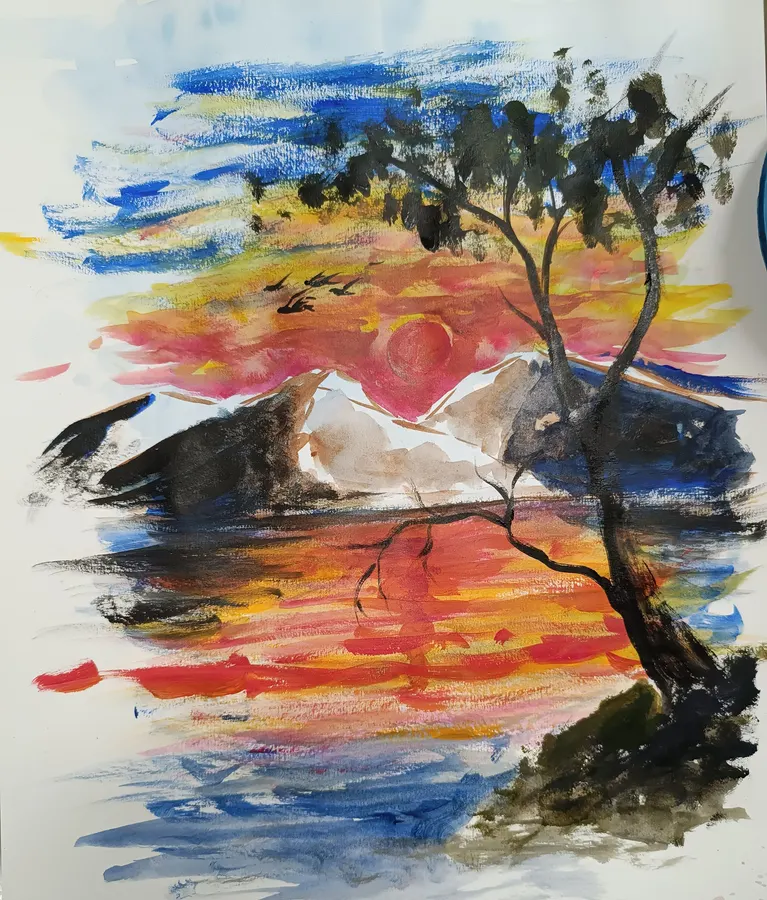 Watercolour of a red sun setting behind snow-capped mountains, reflected across a lake, with a bare tree in the foreground.